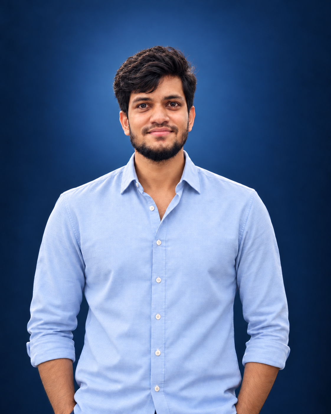 MD Rahidul Islam smiling in a semi-formal blue shirt